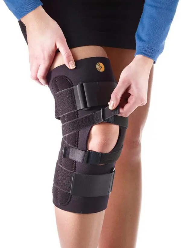 Adjustable knee brace on leg