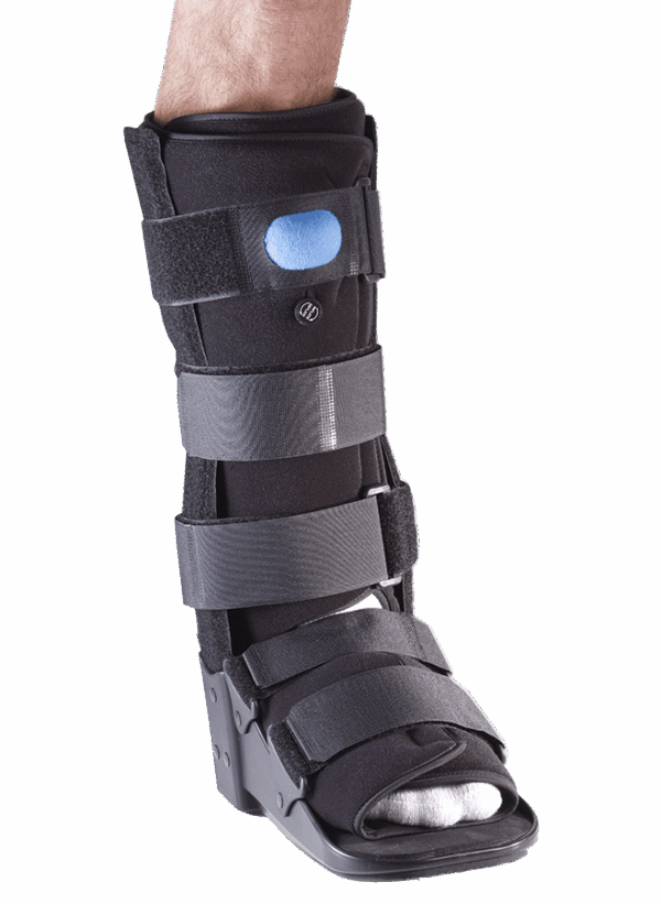 Medical walking boot on injured leg