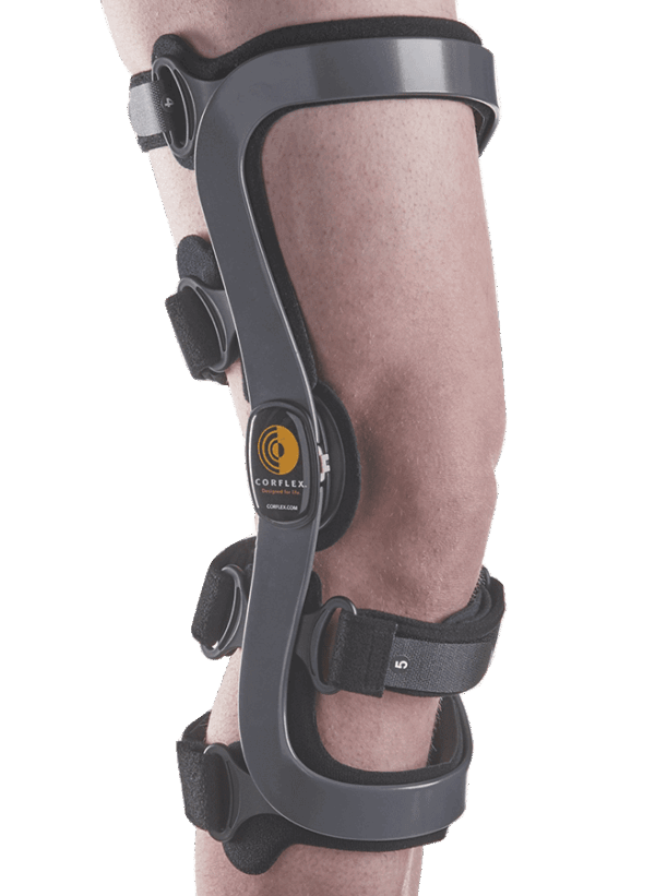 Knee brace on leg with black straps